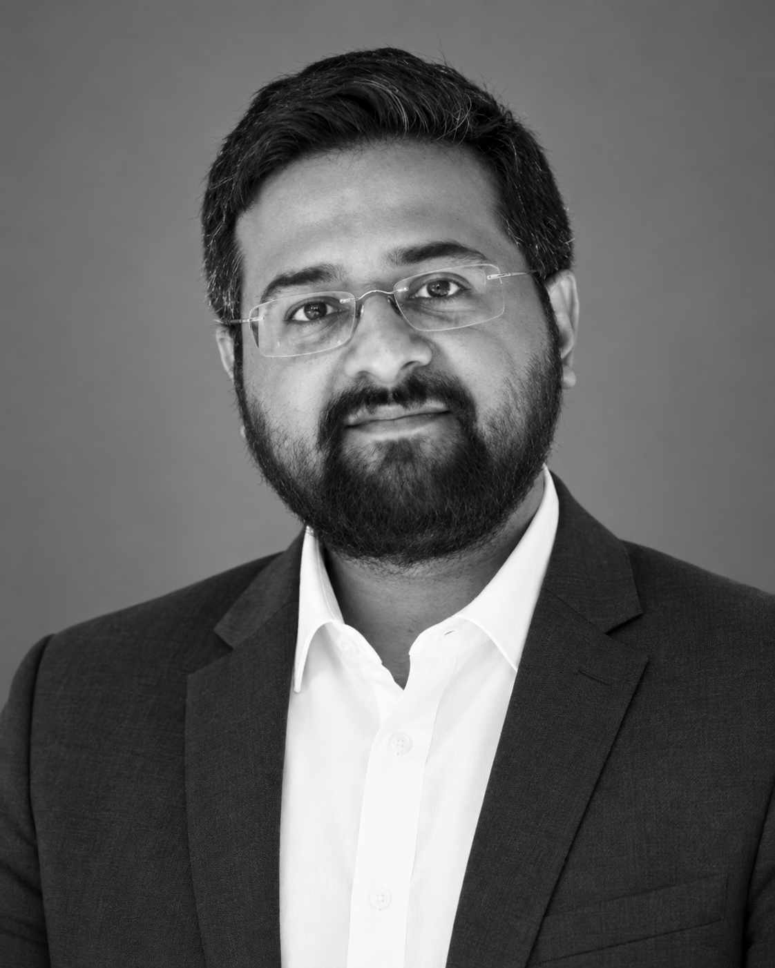 Black-and-white portrait of Mithun Kalan